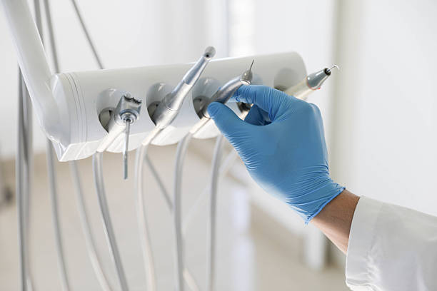 Professional Emergency Dentist technician working in Rochester, NY